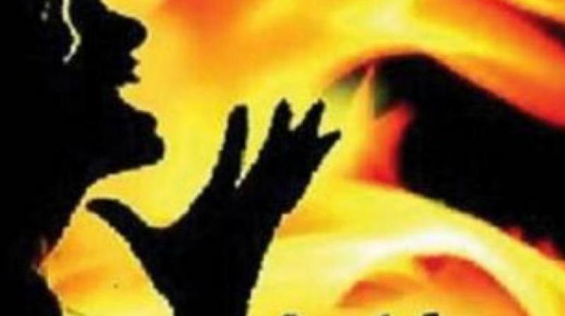 husband burnt wife and two children alive at etah