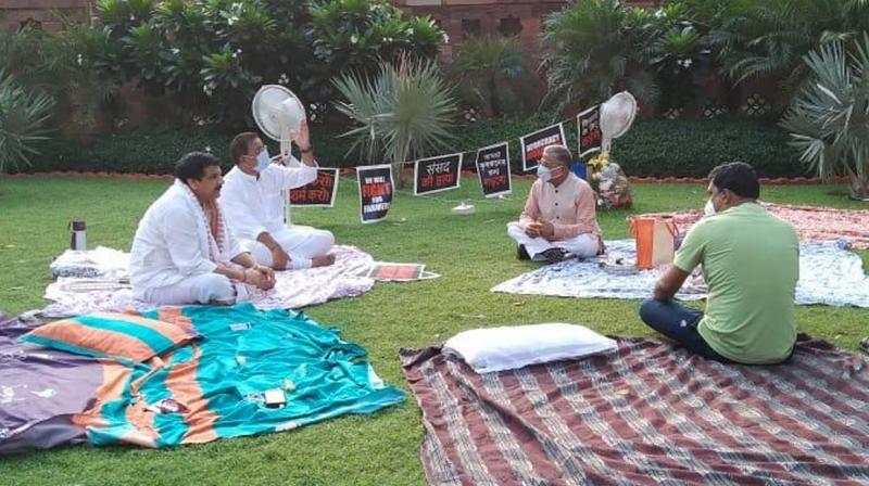 Harivansh offer tea to protesting Opposition MPs