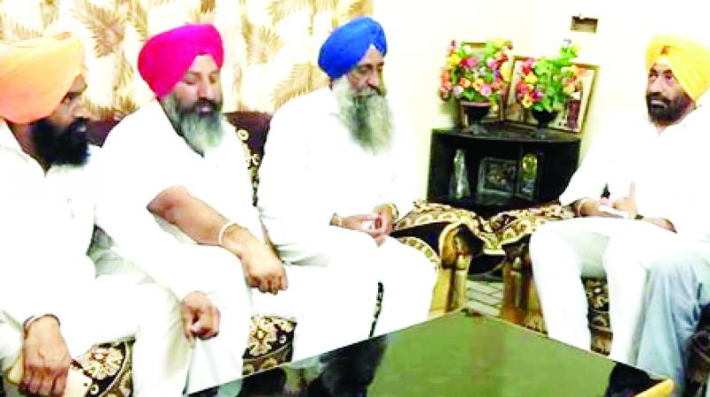 Sukhpal Singh Khaira With Victim's Family Sukhpal Singh Khaira With Victim's Family