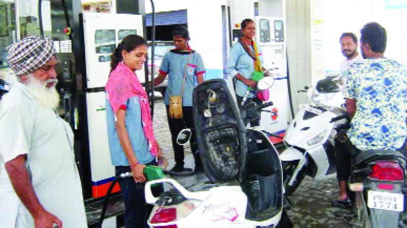 Women Works on Petrol Pump