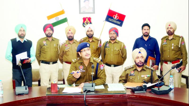 SSP Sangrur and other police officers while giving information about the captured person