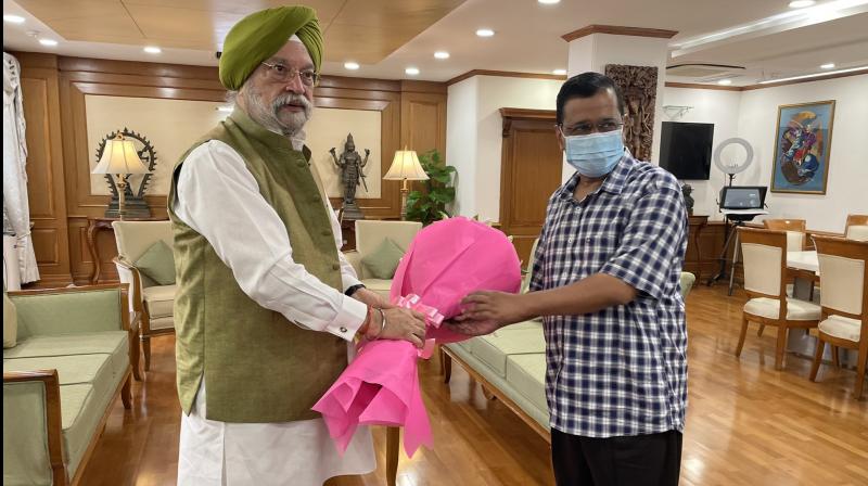 Arvind Kejriwal meets Hardeep Puri