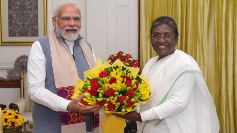 Prime Minister Narendra Modi calls on President Droupadi Murmu at Rashtrapati Bhavan in Delhi.