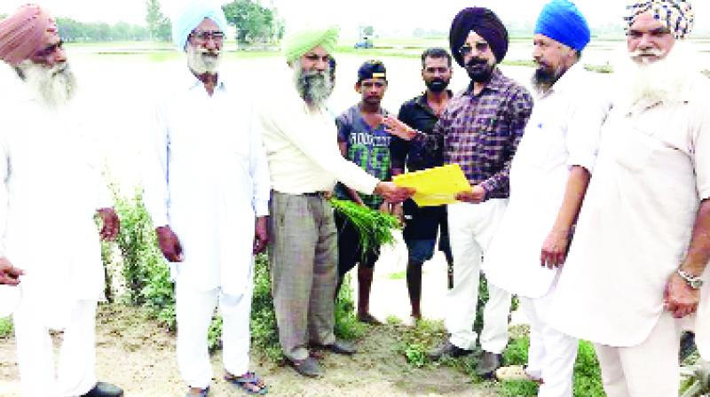 Officer Giving Bill to Farmer Officer Giving Bill to Farmer