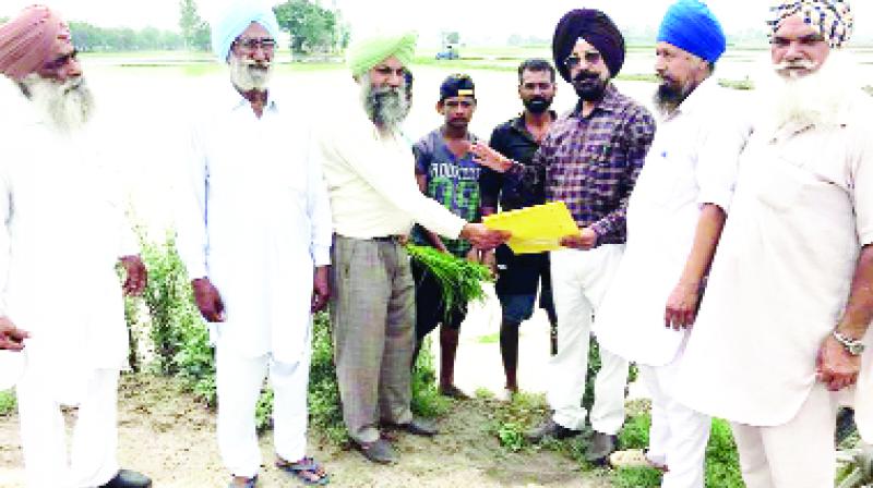 Officer Giving Bill to Farmer