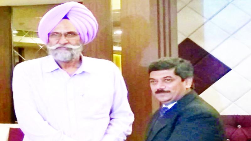 Powercom MD Engineer Baldev Singh Sra and Chief Project Officer of National Payment Corporation R. Ramesh