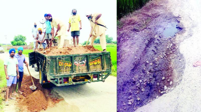 social workers Youngsters, filling the pits in the road, and View of the big potholes lying on the road social workers Youngsters, filling the pits in the road, and View of the big potholes lying on the road