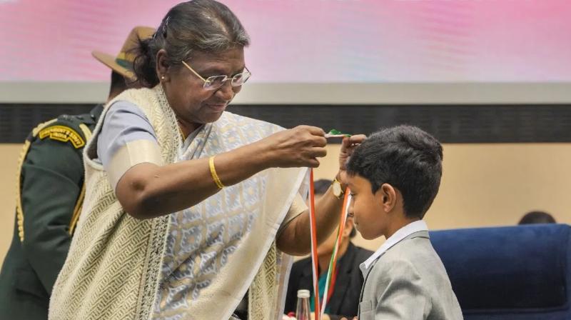 8-year-old child Rishi Shiva Prasanna received the prestigious PM National Child Award 8-year-old child Rishi Shiva Prasanna received the prestigious PM National Child Award