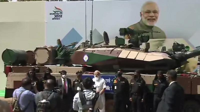 Narendra Modi hands over Arjun Tank to Army Chief Narendra Modi hands over Arjun Tank to Army Chief