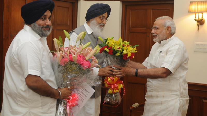 Parkash Singh Badal and Sukhbir Badal With Narendra Modi Parkash Singh Badal and Sukhbir Badal With Narendra Modi