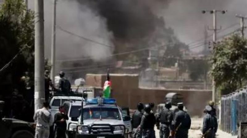 Explosions in Afghan election rally