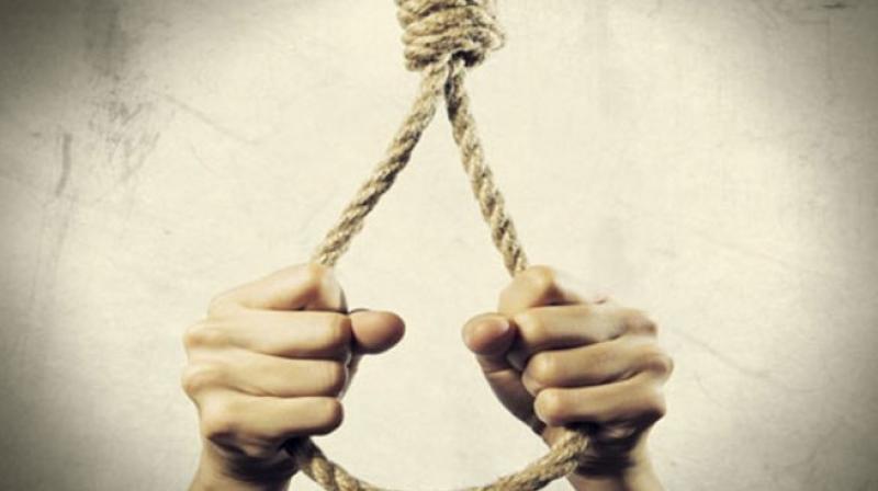 Committed suicide by hanging