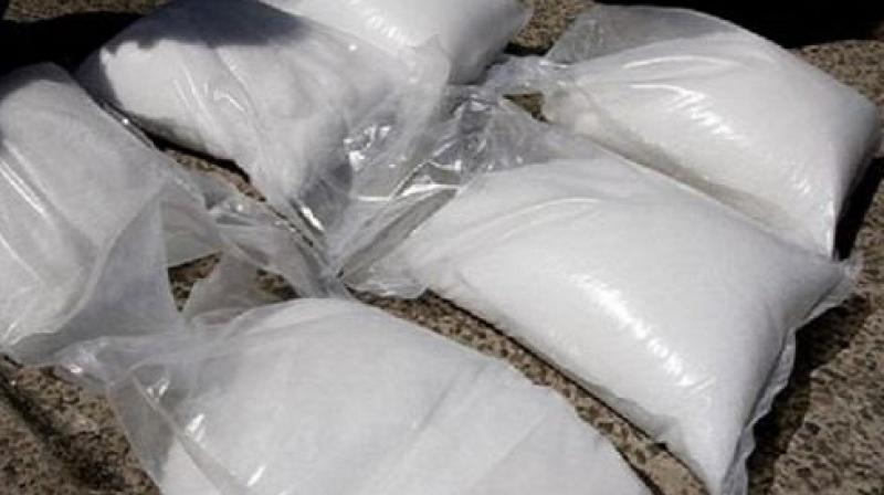5 kg of 650 grams heroin & 2 Pak SIM 5 kg of 650 grams heroin & 2 Pak SIM