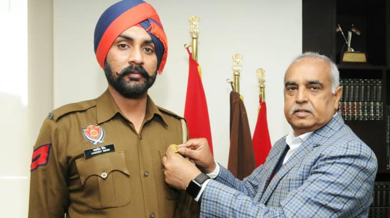 DGP honors employee who plays a leading role in social work DGP honors employee who plays a leading role in social work