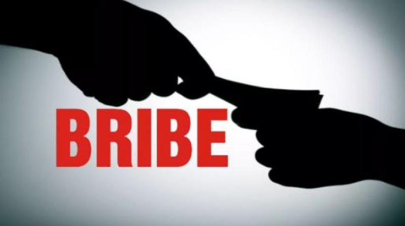 Vigilance nabs ASI for taking bribe