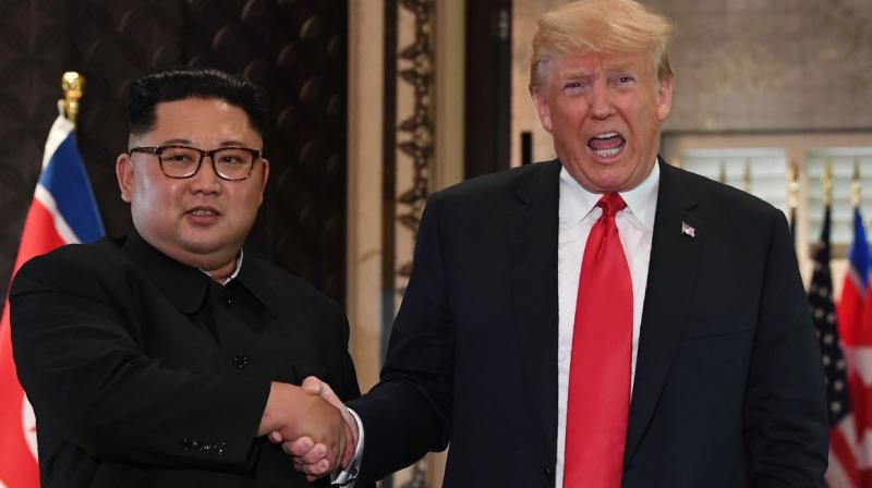 Kim Yong Un with Trump 