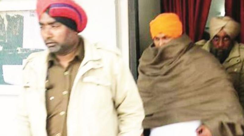 Former Sarpanch arrested with heroin Former Sarpanch arrested with heroin