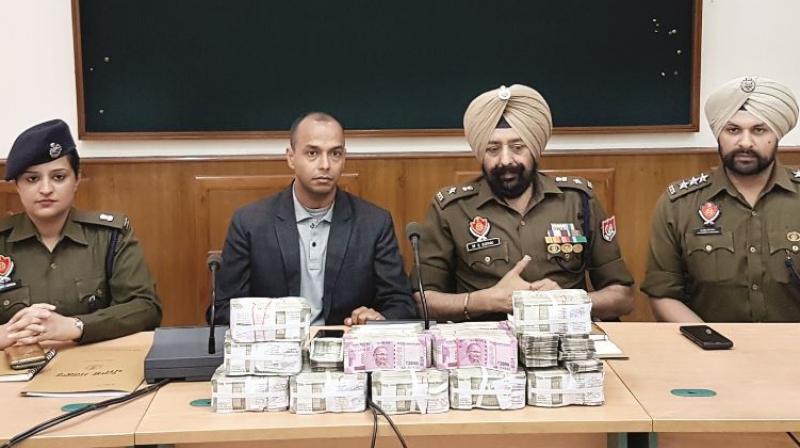 Patiala Police seized Rs 92.50 lakh cash Patiala Police seized Rs 92.50 lakh cash
