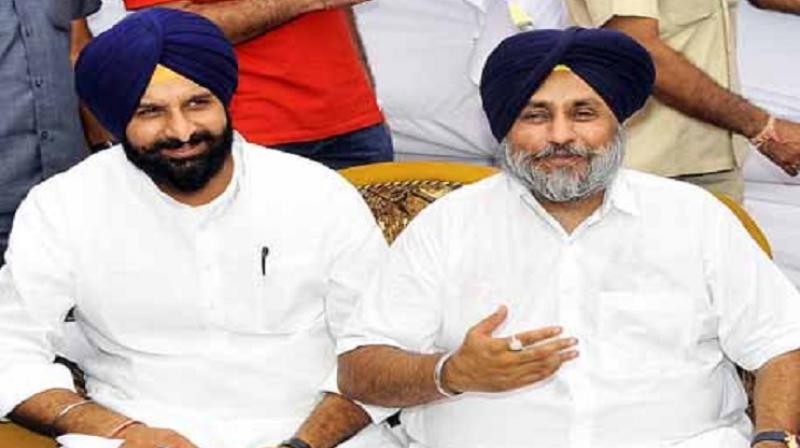 Majithia with Sukhbir Badal 