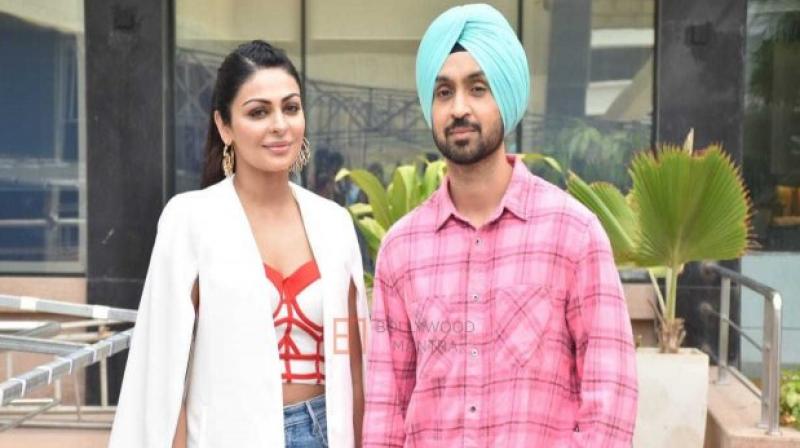 Neeru Bajwa with Diljit Dosanj Neeru Bajwa with Diljit Dosanj