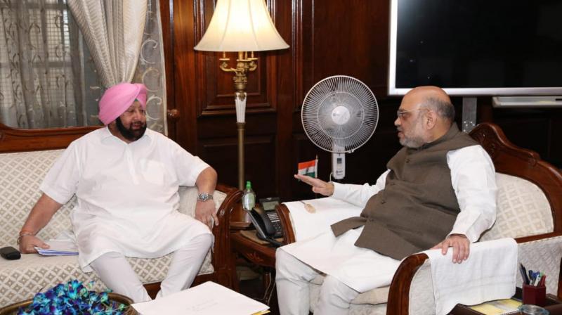 Amit Shar with Captain Amrinder