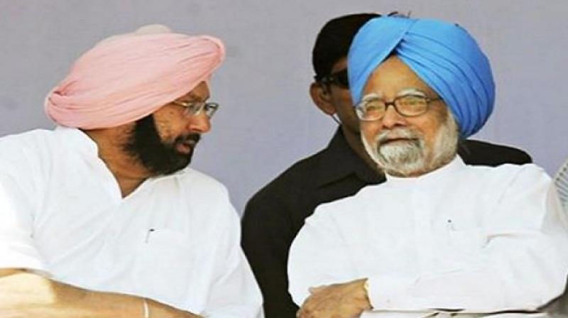 Captain with Manmohan singh