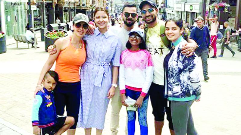 Virat Kohli with his wife Anushka Sharma Virat Kohli with his wife Anushka Sharma