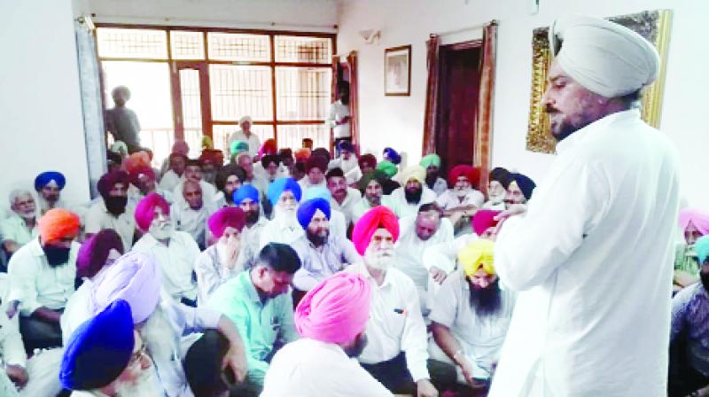 Captain Tejinderpal Singh Sidhu addressing a meeting