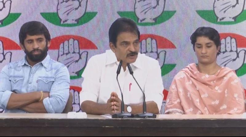 Vinesh Phogat-Bajrang Punia joins Congress Vinesh Phogat-Bajrang Punia joins Congress