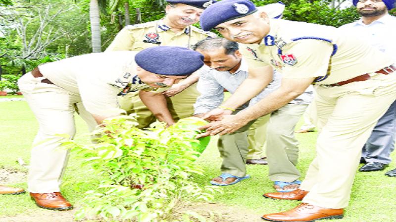 Suresh Arora planting Plants at Police Headquarters
