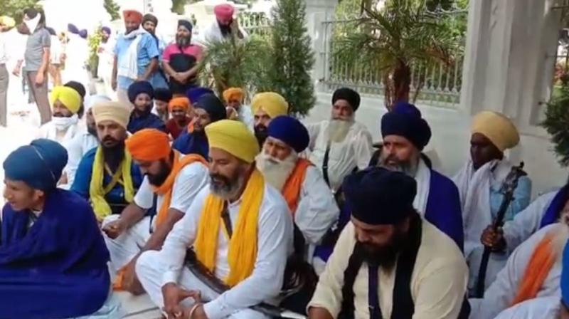 Sikh organizations outside Diwan Hall Manji Sahib