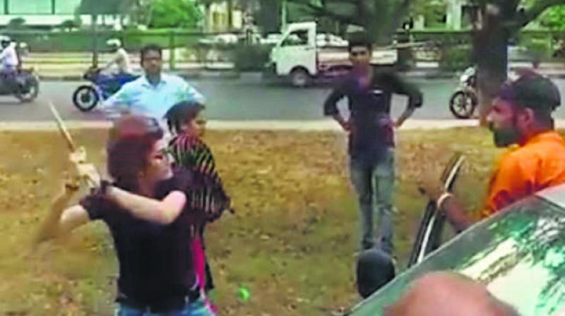 Girl attacks youth with rod in road rage Girl attacks youth with rod in road rage
