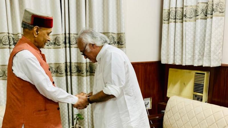 Jairam Ramesh and Prem Kumar Dhumal Jairam Ramesh and Prem Kumar Dhumal