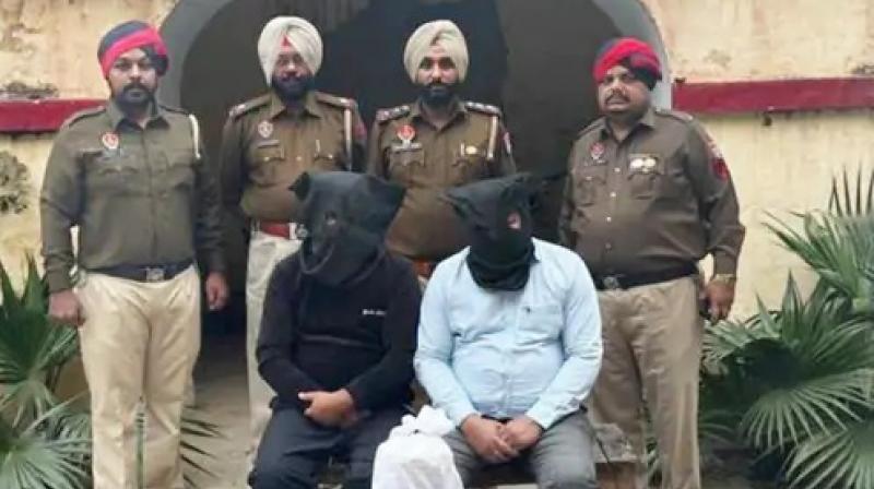 Father and minor son arrested with opium Father and minor son arrested with opium