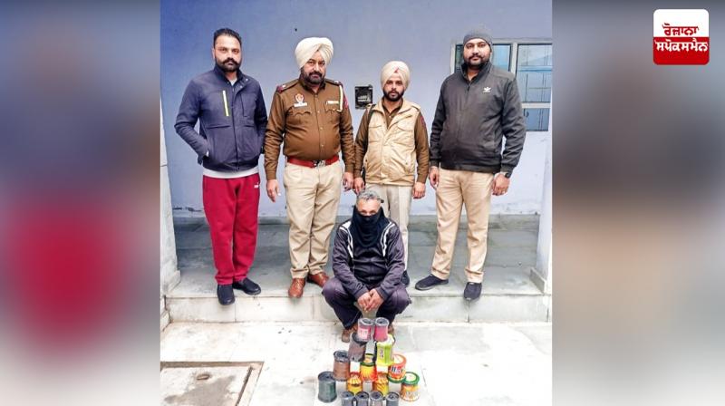 Tarn Taran police arrested a person with 15 bottles of China Door Tarn Taran police arrested a person with 15 bottles of China Door