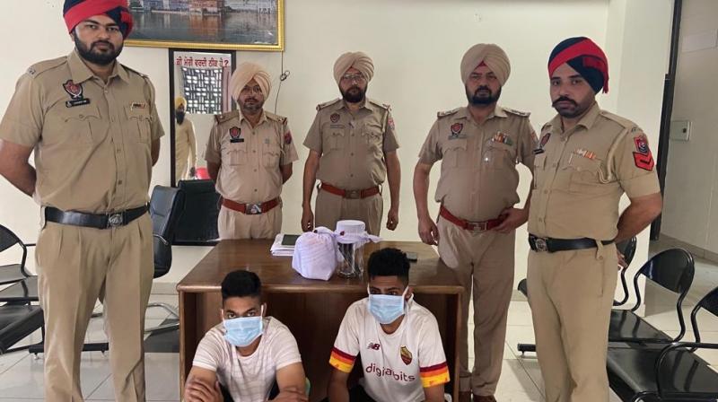 SAS Nagar Police busted drugs/arms smuggling racket & arrested two close associates of gangster Manna Mehal Kalan SAS Nagar Police busted drugs/arms smuggling racket & arrested two close associates of gangster Manna Mehal Kalan