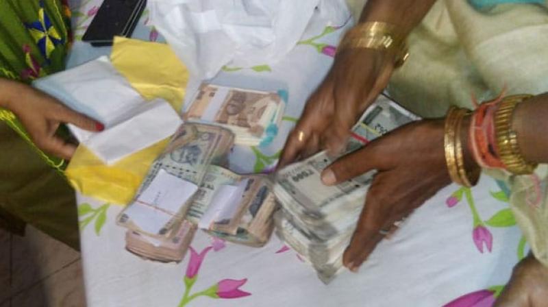 Police recovered cash from BJP candidate Rama Devis office Police recovered cash from BJP candidate Rama Devis office