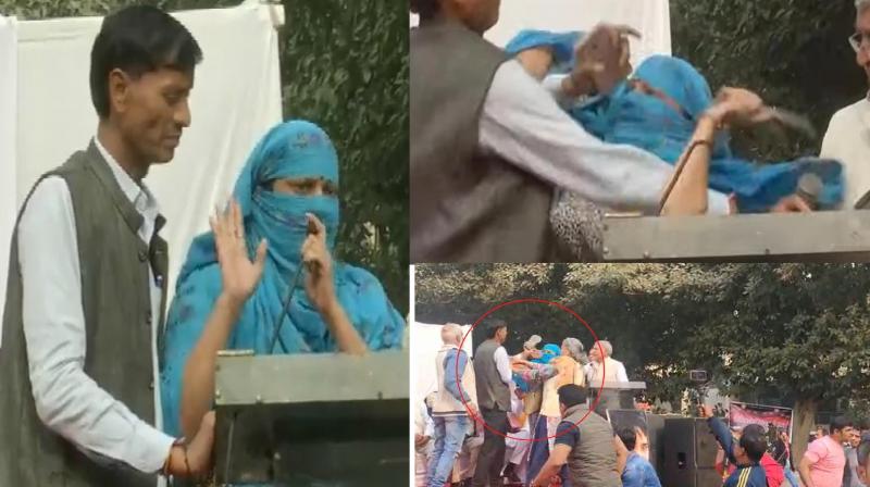 Delhi: Woman beats man with slippers on stage Delhi: Woman beats man with slippers on stage