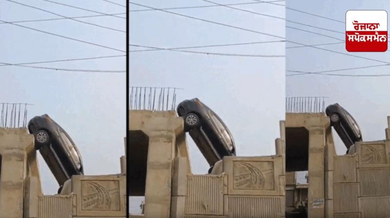 Car hangs mid-air from unfinished flyover in UP Car hangs mid-air from unfinished flyover in UP