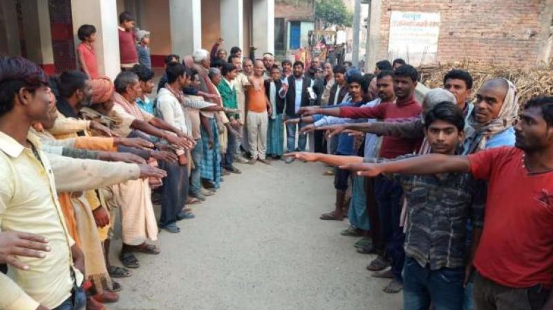 Villagers taking oath against death feast Villagers taking oath against death feast