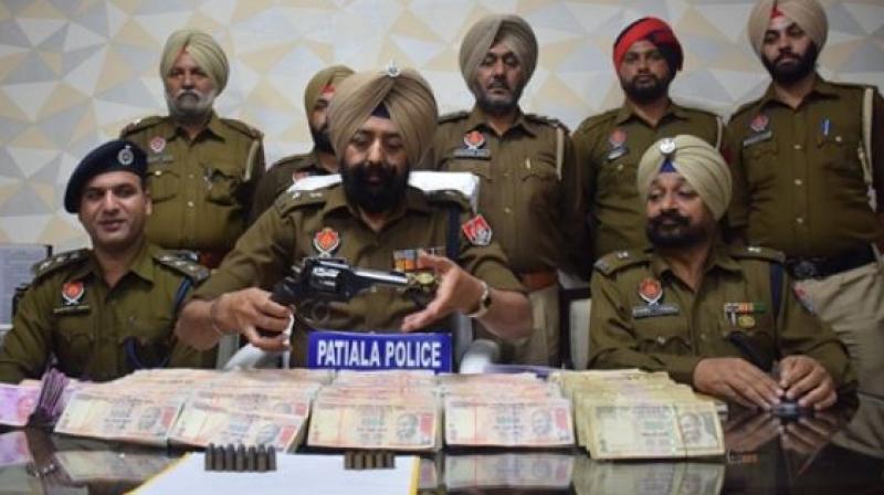 Patiala police arrests Rs 1 crore old currency Patiala police arrests Rs 1 crore old currency