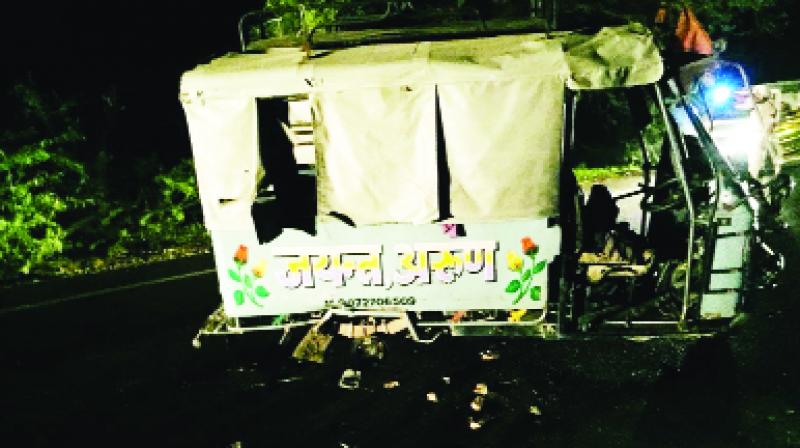 Auto rickshaw damaged during accident. Auto rickshaw damaged during accident.