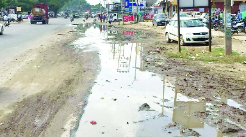 Kurali-Kharar road Rain water before the SBI Bank Kurali-Kharar road Rain water before the SBI Bank