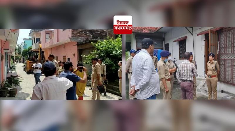 Bulldozer helps UP woman enter home after in-laws throw her out over dowry Bulldozer helps UP woman enter home after in-laws throw her out over dowry