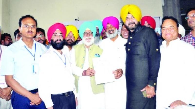 Hardev Singh Laddi Showing Winning Letter