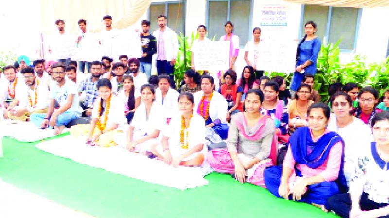 College students sitting on hunger strike during dharna College students sitting on hunger strike during dharna