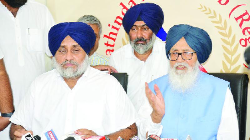 Parkash Singh Badal and Sukhbir Singh Badal During Press Conference