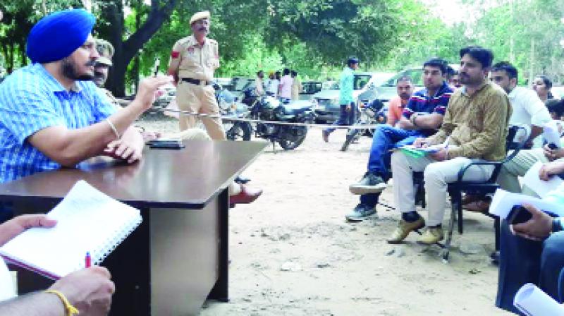 SP Jalla Giving Information to Police Consultant