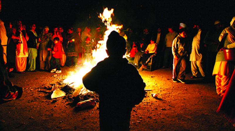Lohri is a common festival of happiness Lohri is a common festival of happiness