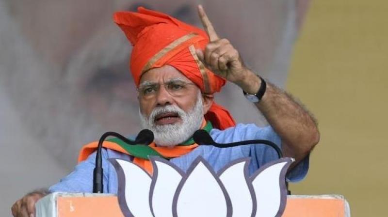 Modi addressing an election rally in Kathua